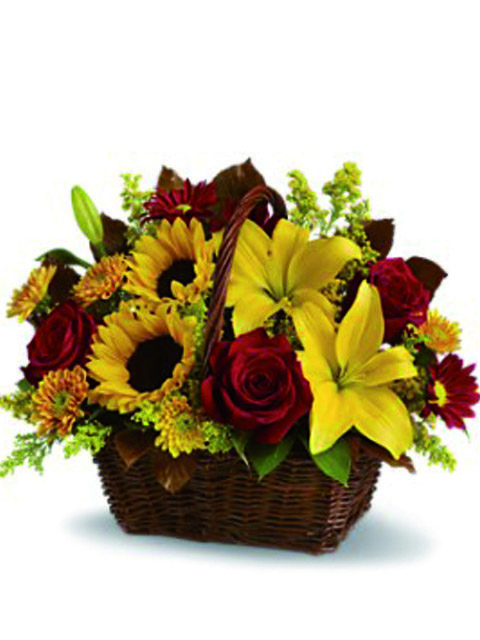 Cesto rose rosse gigli e girasoli