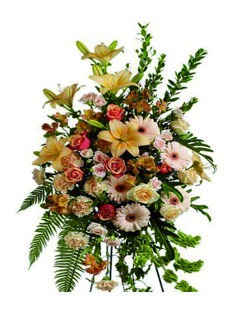 Cuscino funebre di fiori dai toni rosa chiaro